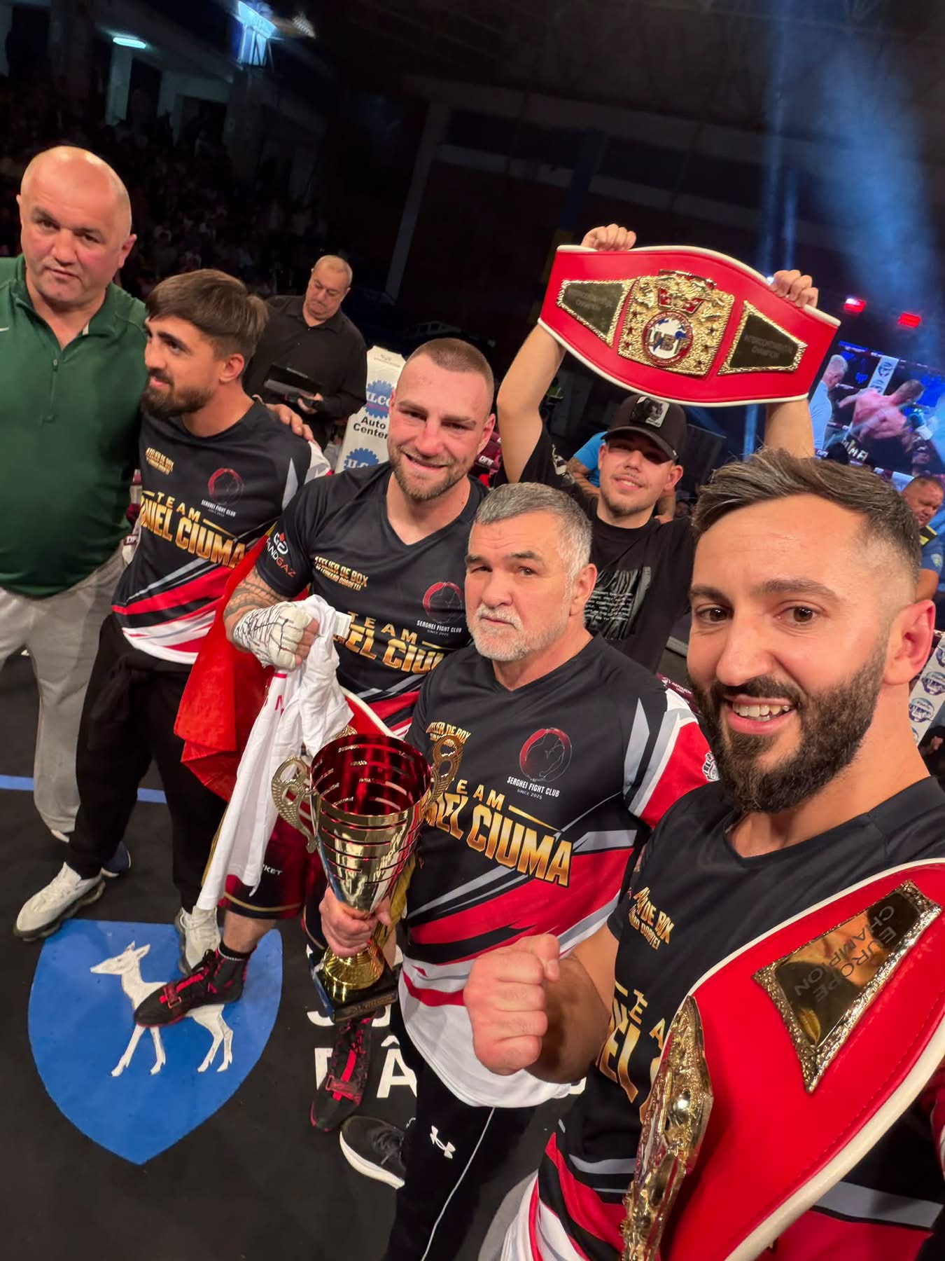 Ion Daniel Ciuma and his team celebrate his UBF world championship victory in Târgoviște, Romania.